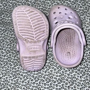 Used purple crocs